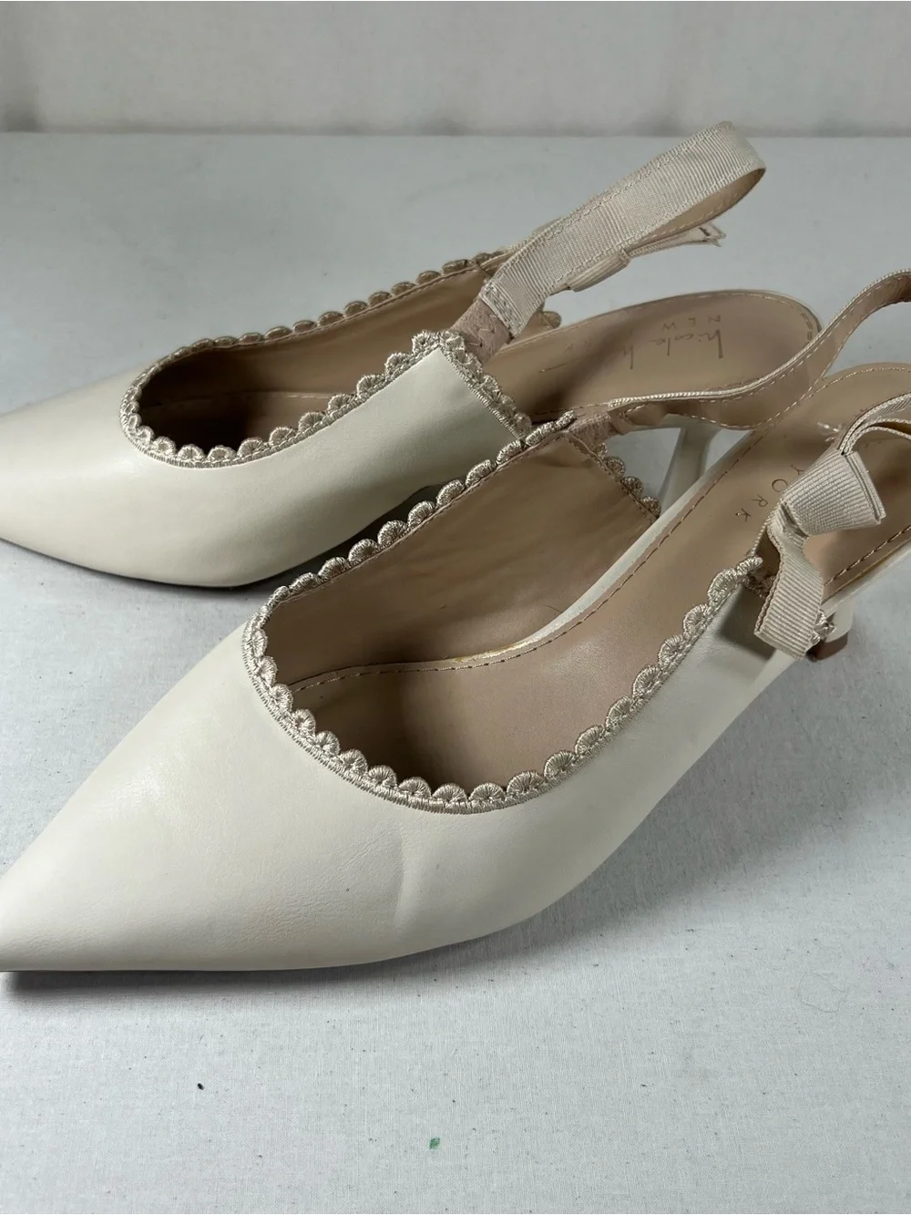 Nicole Miller Cream Pointed-Toe Slingback Flats with Scallop Trim